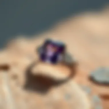 An elegant amethyst gemstone set in a silver ring, emphasizing its beauty and elegance.