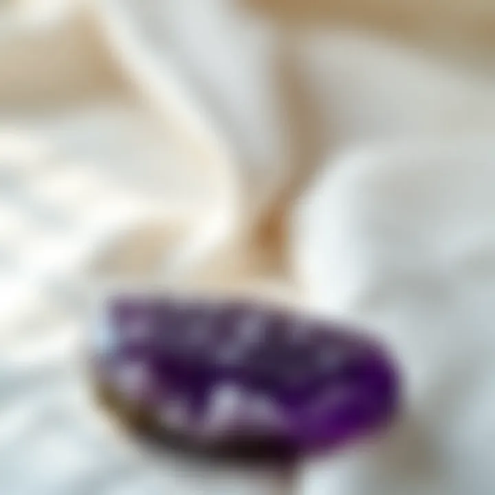 A serene image of an amethyst stone placed on a soft fabric, conveying tranquility and spiritual energy.