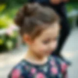Charming messy bun hairstyle for children at a wedding