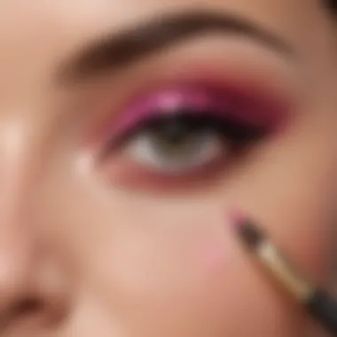 A close-up of a blending brush in action with vibrant eyeshadow colors.