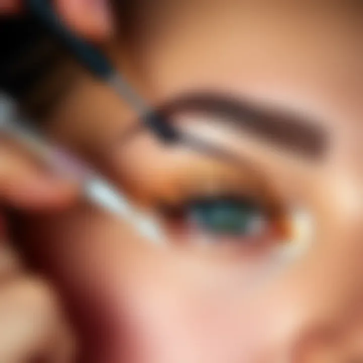 Close-up of a brow gel being applied with precision