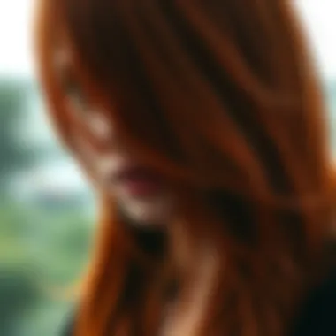 Close-up of red hair showing signs of fading