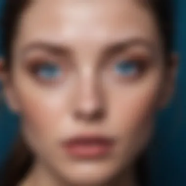 A serene portrait of a woman with striking blue eyes, conveying emotion