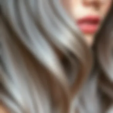 A close-up of hair dyed in a light ash color, highlighting shine and texture